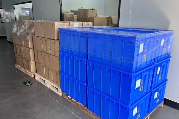 gasket boxes stacked under pressure in storage