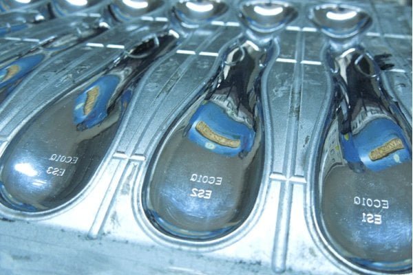 SPI A mirror finish mold surface on a silicone part