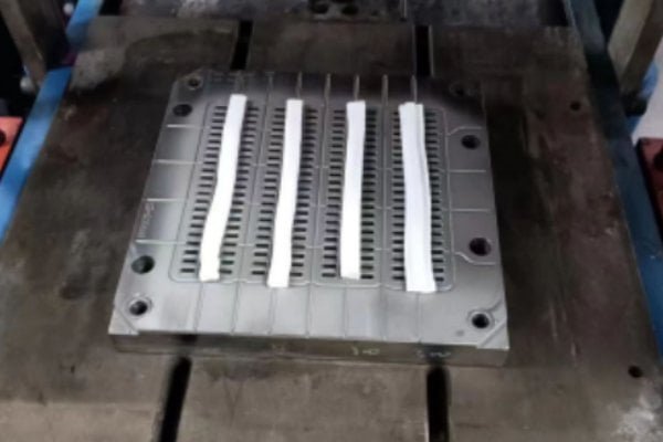 Silicone grommet ring mold loaded on the press for the trial run